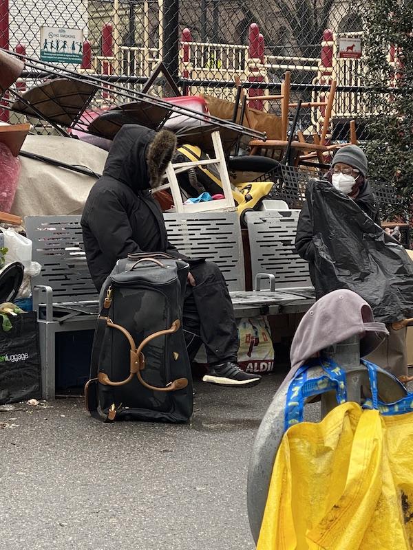 Hoarder with suitcase on Upper West Side